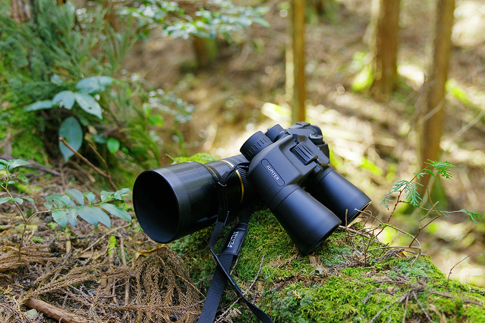 Binoculars and spotting scope in nature