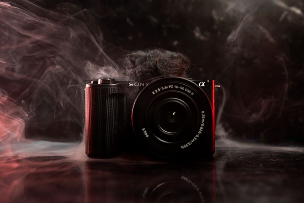 Sony ZV-E10 with red smoke product shot