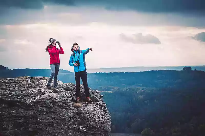 Enjoying binoculars to view nature