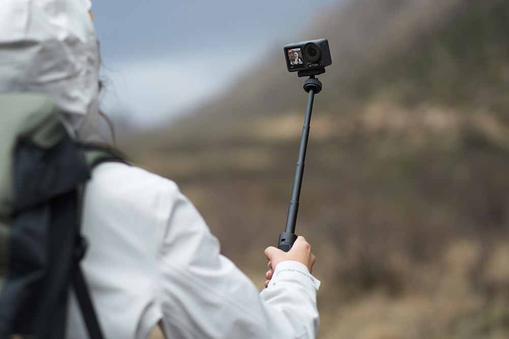 Using a selfie extension stick for hiking and voice control