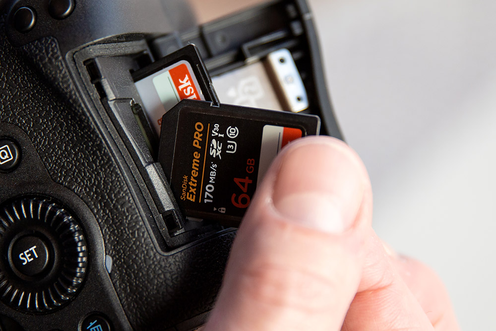 Insering an SD card into camera (dual slot)