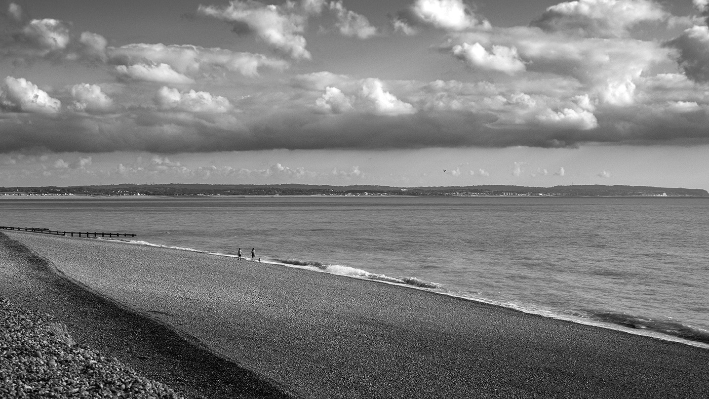 X-M5 Sample image 03 B&W beach with XC 15-45mm F/3.5-5.6 OIS PZ. Camera settings: 1/1250 sec. f/5.6. ISO 400