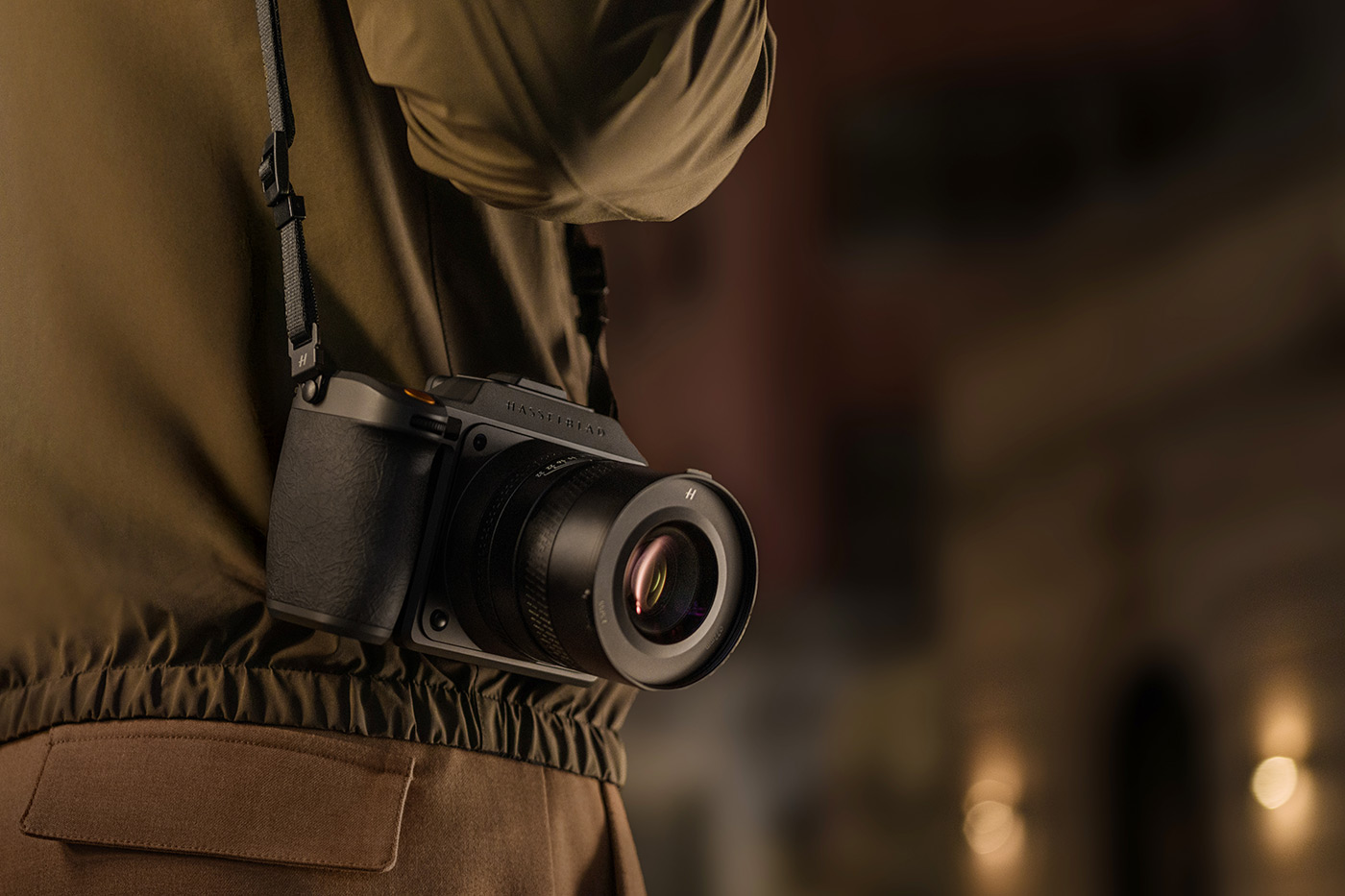 Next-gen Hasselblad X2D II 100C slung around shoulder