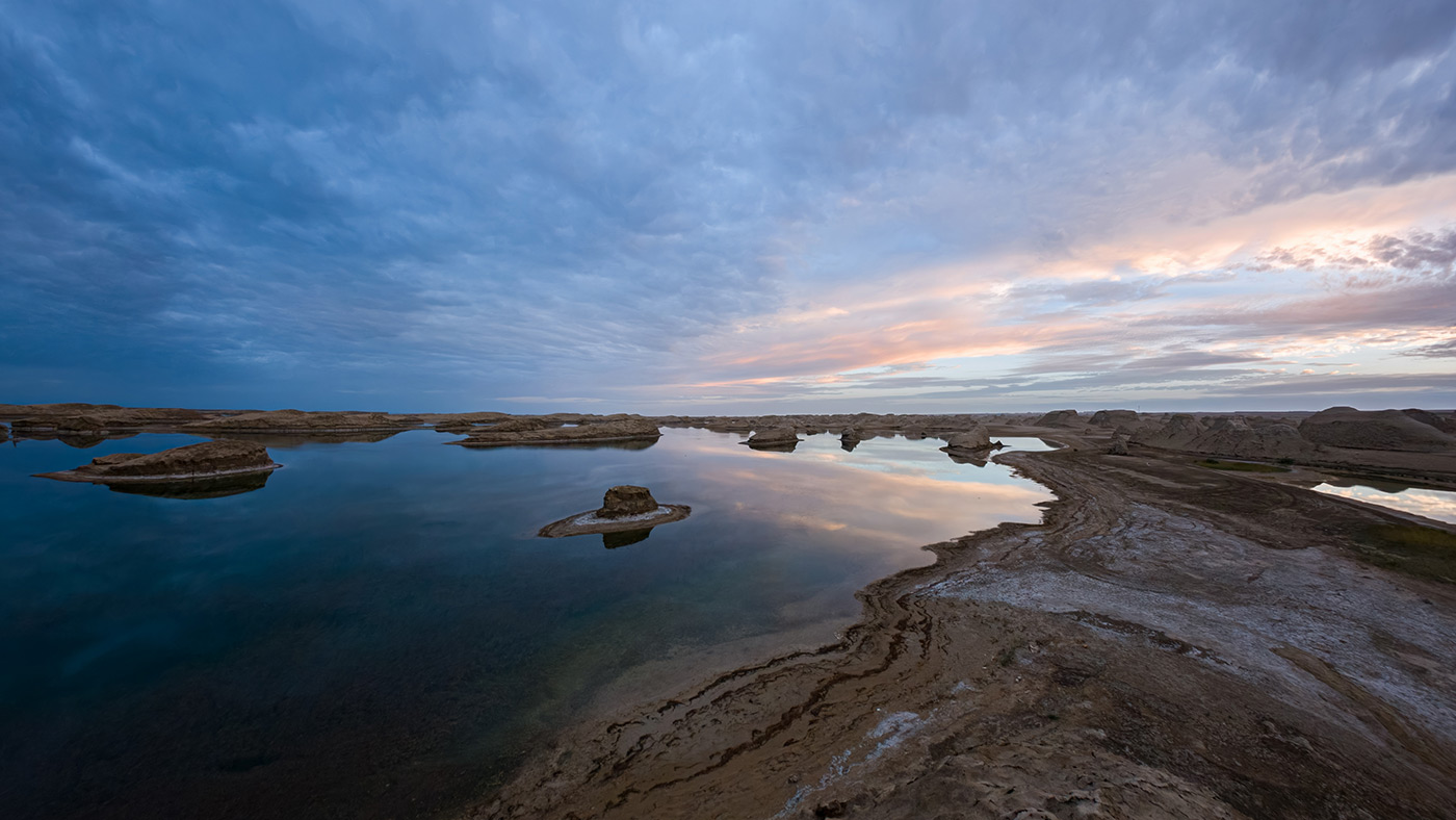 Low light landscape image showing sunset colours and wide dynamic range