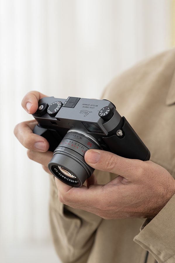 Holding the new Rangefinder and APO Summicron-M 50mm f/2 ASPH lens