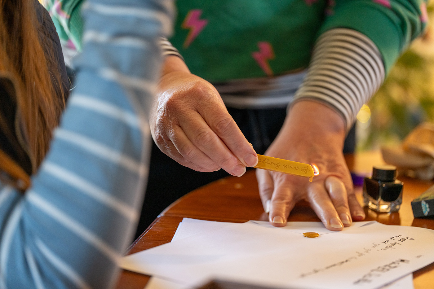 Sample 10 Candle Sony FE 100mm F2.8 Macro GM OSS Lens. Camera settings: 1/60 sec. f/2.8. ISO 2000