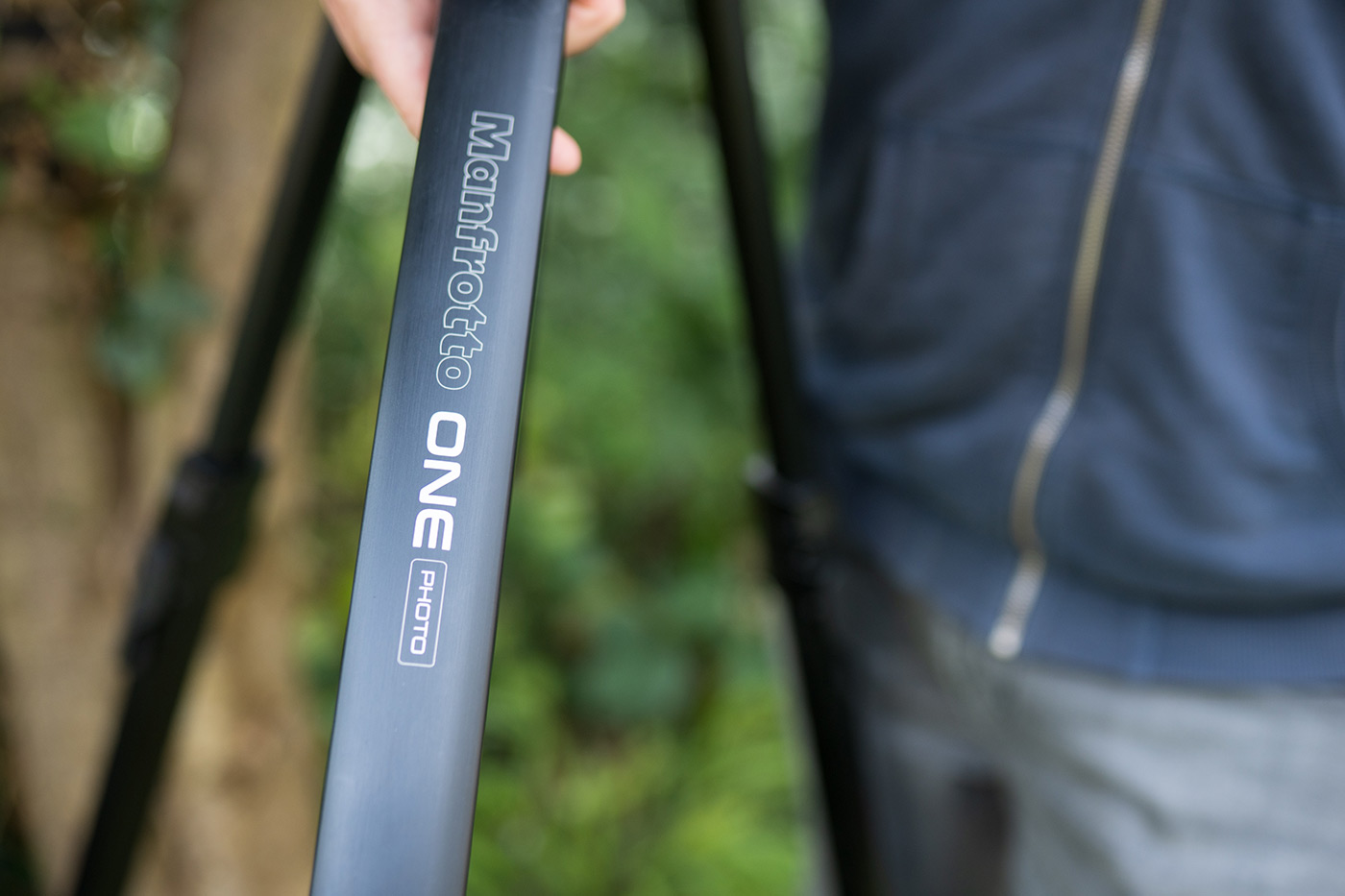 Logo closeup with ONE leg shape