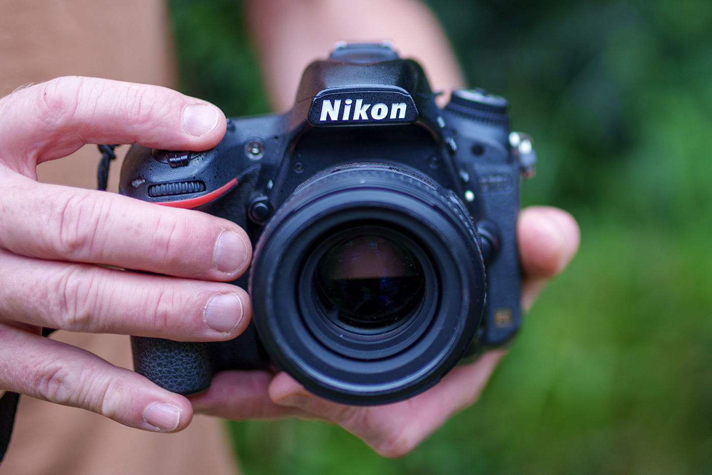 Handholding Nikon D750 with AF-S 50mm lens attached