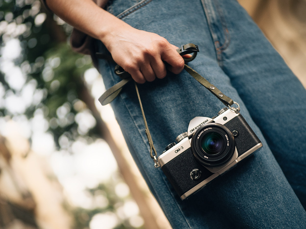 Film-inspired black and silver body of the OM-3 camera