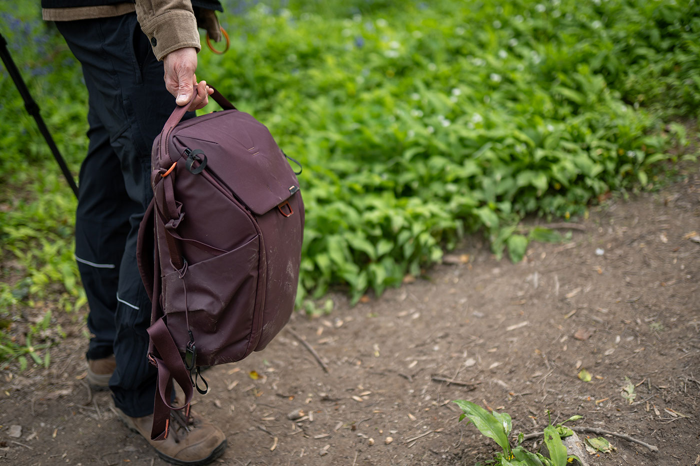 Carrying the pack via the top grab handle