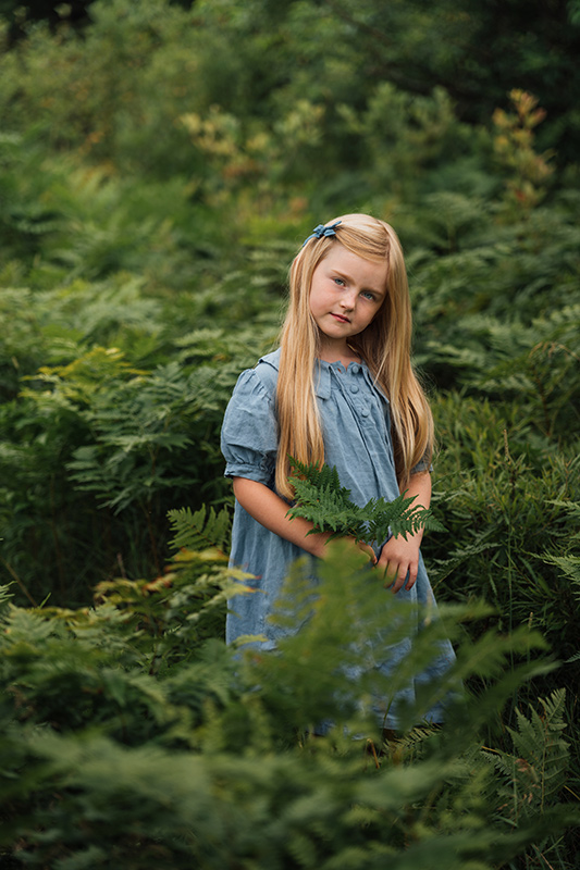 Sample portrait of girl in woods using the new Sigma 28-105mm Art lens for mirrorless