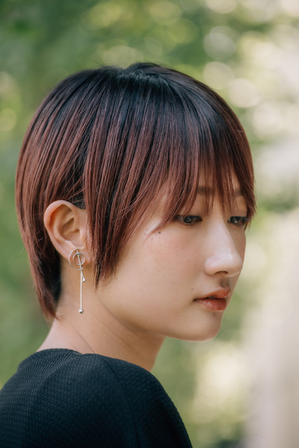 Sample 01 portrait at 87mm © Naoki Miyashita. Settings: 1/350 sec. f/2.8. ISO 200