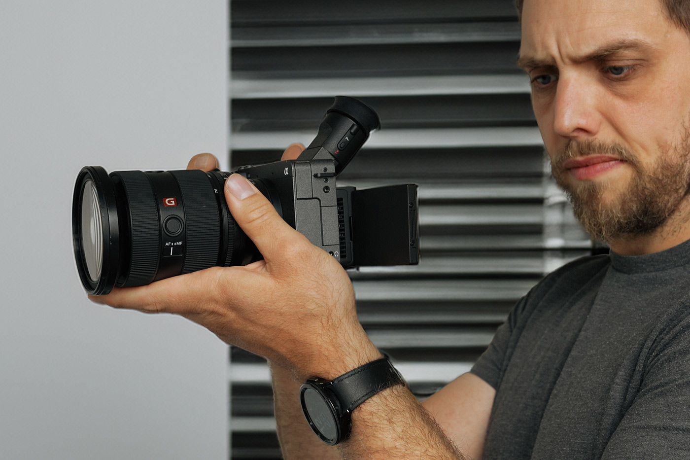 Holding up the compact video camera