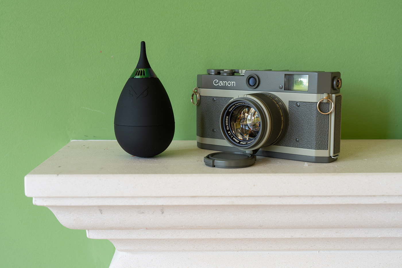 VSGO on mantlepiece with film camera