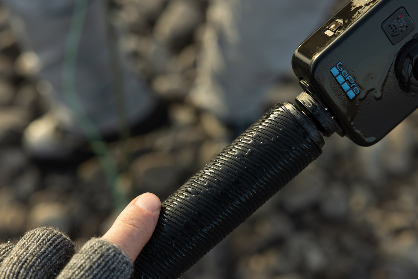 Selfie stick in rain during hiking with GoPro