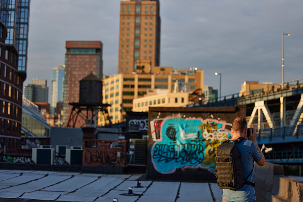black-backpack-in-the-field-03 black-backpack-in-the-field-03